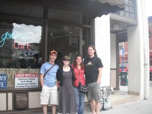 The PDX gang at John's Cafe. Note the bullet hole in the window.